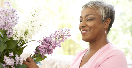 Senior Woman Arranging Flowers Senior Woman Arranging Flowers